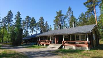 Фото номера Коттедж с 1 спальней и сауной Курортные отели Holiday Resort Harjun Portti г. Пункахарью 6