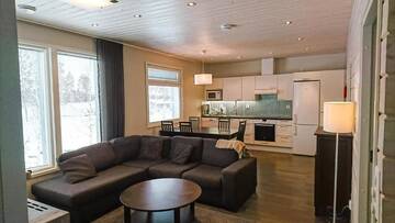 Фото номера Дом с 2 спальнями Курортные отели Holiday Resort Harjun Portti г. Пункахарью 3