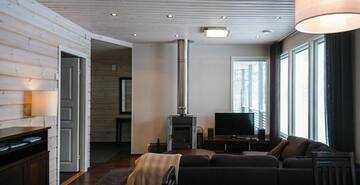 Фото номера Дом с 2 спальнями Курортные отели Holiday Resort Harjun Portti г. Пункахарью 2