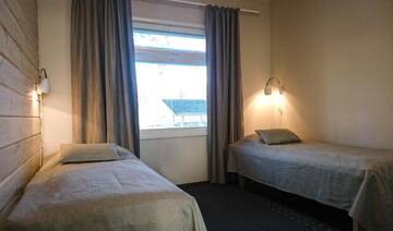 Фото номера Дом с 2 спальнями Курортные отели Holiday Resort Harjun Portti г. Пункахарью 7